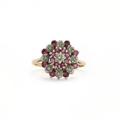 Lot 85 - A 9ct gold ruby and diamond cluster ring