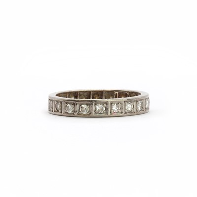 Lot 66 - A white gold diamond set full eternity ring