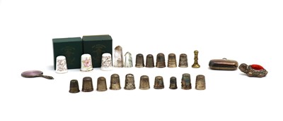 Lot 40 - A collection of fourteen silver thimbles