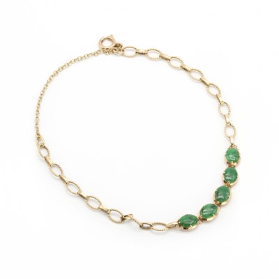 Lot 108 - A 9ct gold and nephrite bracelet