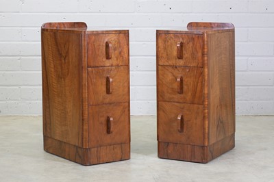 Lot 210 - A pair of Art Deco walnut bedside tables