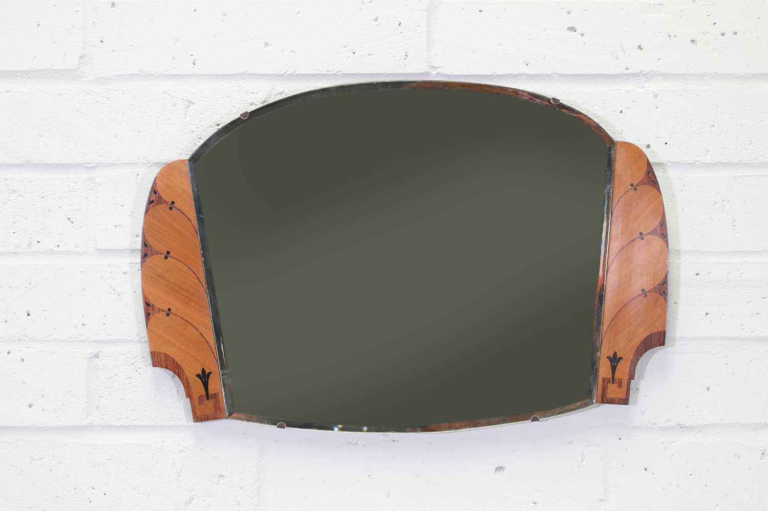 Lot 183 - An Art Deco cloud-shaped mirror