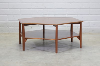Lot 332 - An hexagonal walnut coffee table