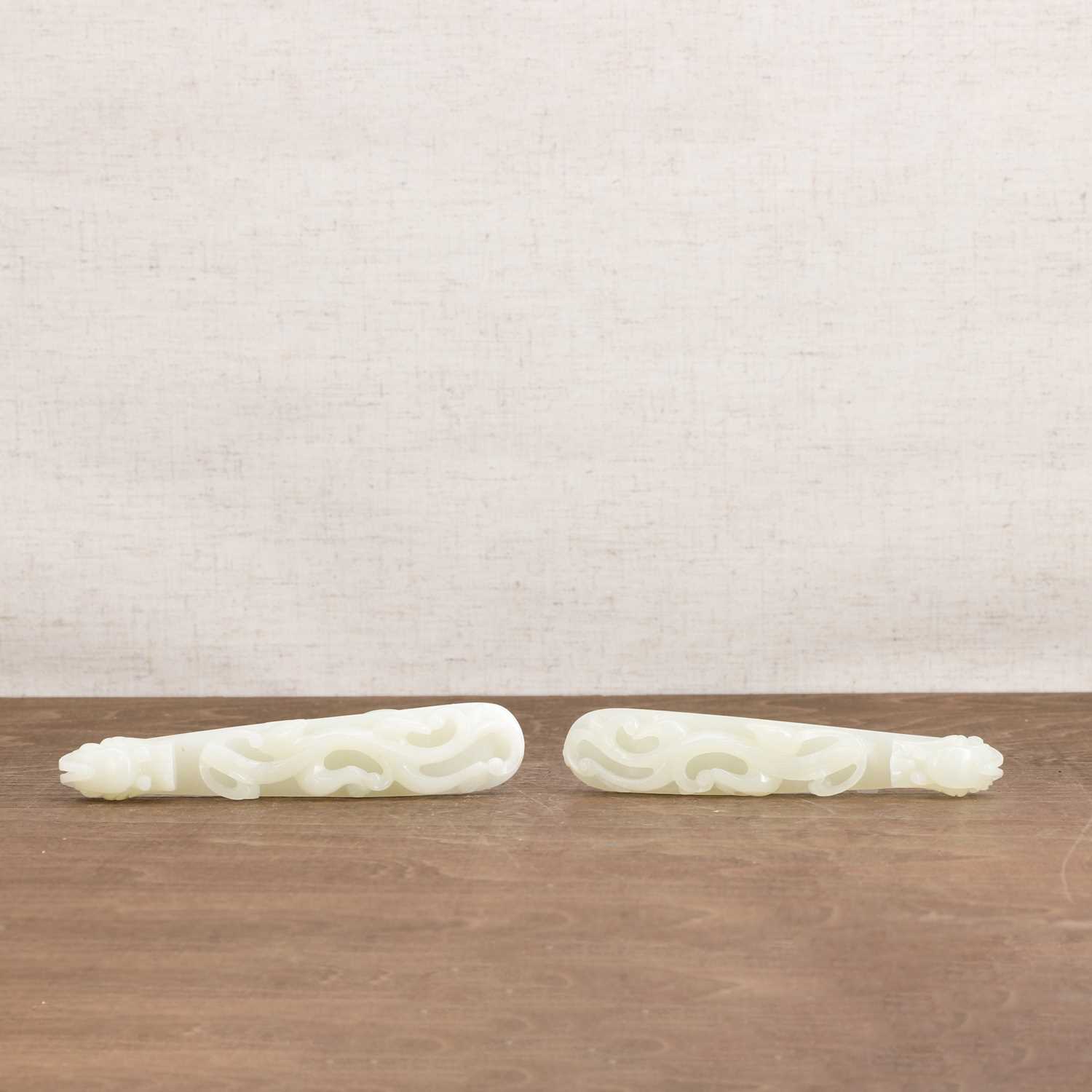 Lot 103 - Two Chinese jade belt hooks