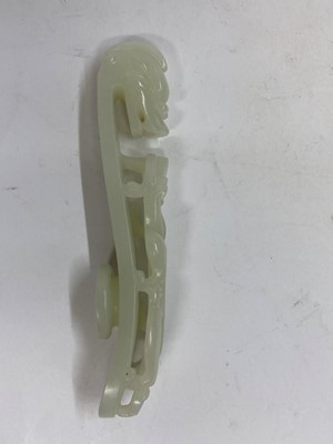 Lot 103 - Two Chinese jade belt hooks