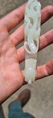 Lot 103 - Two Chinese jade belt hooks