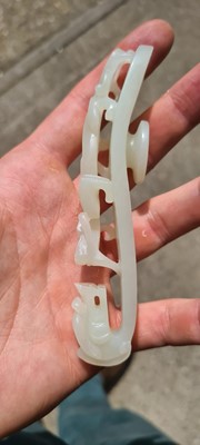 Lot 103 - Two Chinese jade belt hooks