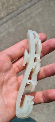 Lot 103 - Two Chinese jade belt hooks