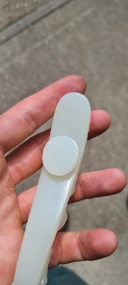 Lot 103 - Two Chinese jade belt hooks