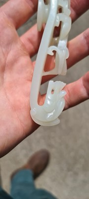 Lot 103 - Two Chinese jade belt hooks