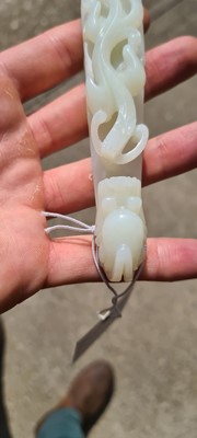 Lot 103 - Two Chinese jade belt hooks