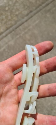 Lot 103 - Two Chinese jade belt hooks