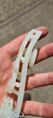 Lot 103 - Two Chinese jade belt hooks