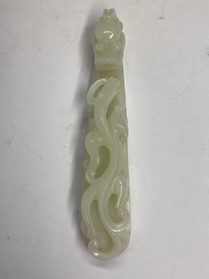 Lot 103 - Two Chinese jade belt hooks