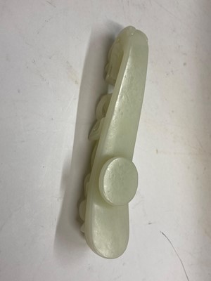Lot 103 - Two Chinese jade belt hooks