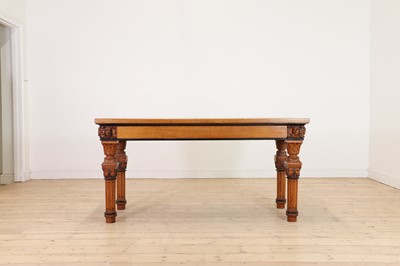Lot 513 - A golden oak library table