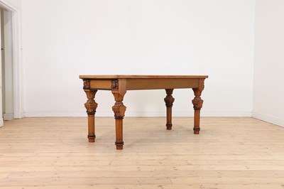 Lot 513 - A golden oak library table