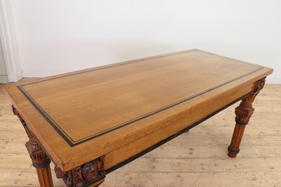 Lot 513 - A golden oak library table