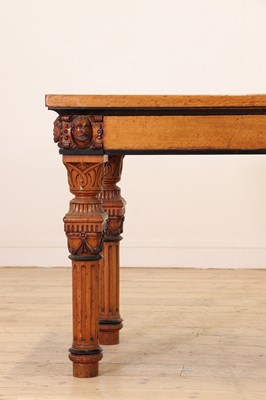 Lot 513 - A golden oak library table