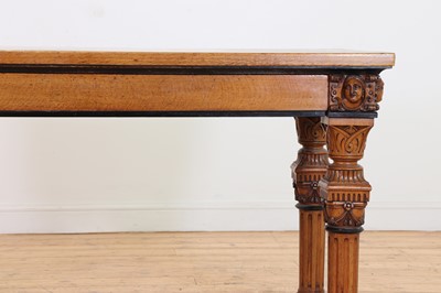 Lot 513 - A golden oak library table