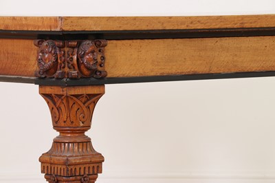 Lot 513 - A golden oak library table
