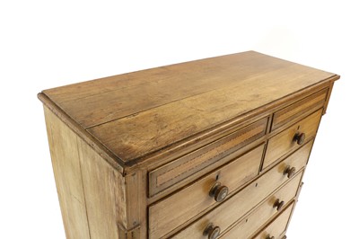 Lot 283 - An oak chest of drawers