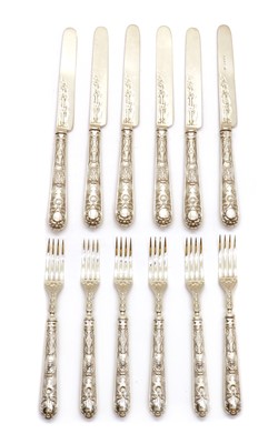 Lot 5 - A set of Victorian silver knives and forks