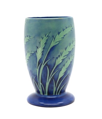 Lot 93 - A William Moorcroft pottery 'Waving Corn' pattern vase
