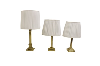 Lot 174 - A pair of Victorian brass column lamps