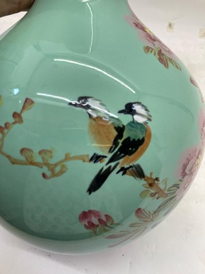 Lot 93 - A Chinese green glazed vase