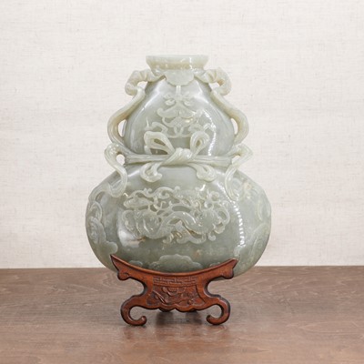 Lot 201 - A Chinese jade wall vase