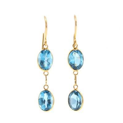 Lot 458 - A pair of gold blue topaz earrings