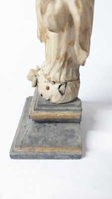 Lot 92 - An alabaster figure of the Immaculate Virgin