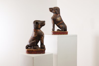 Lot 372 - A pair of painted wooden dogs