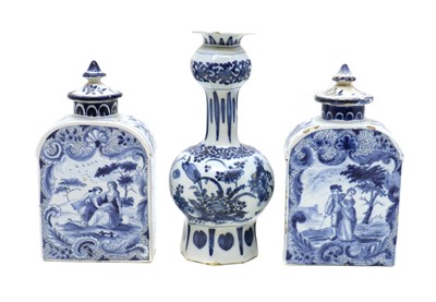 Lot 86 - A pair of Delft pottery tea canisters