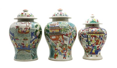 Lot 81 - Three Chinese famille rose jars and covers