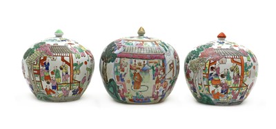 Lot 57 - Three Chinese famille rose jars and covers