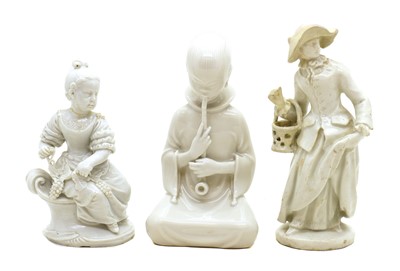 Lot 108 - A group of three blanc de chine porcelain figures
