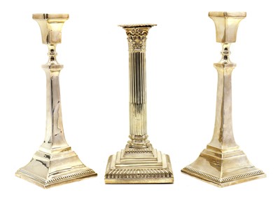 Lot 48 - A pair of silver candlesticks