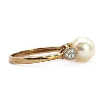 Lot 153 - A gold single stone cultured pearl dress ring