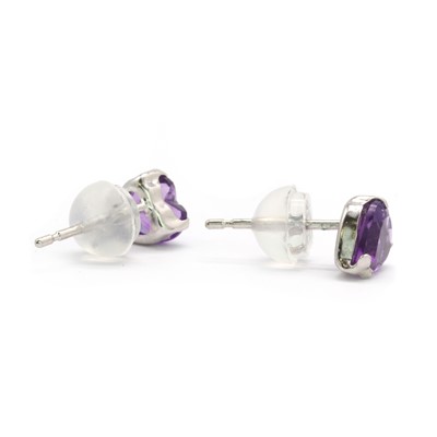 Lot 210 - A pair of white gold amethyst stud earrings