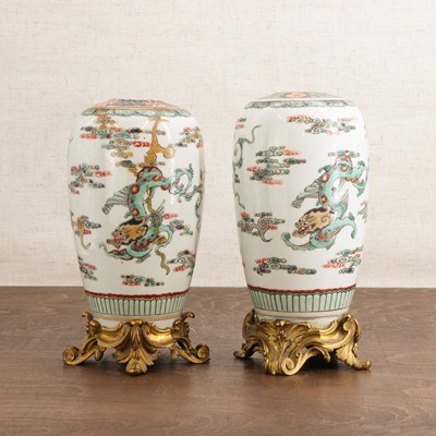 Lot 83 - A pair of Chinese famille verte vases