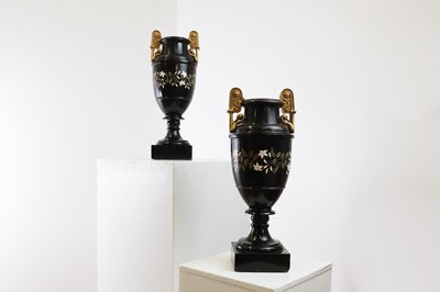 Lot 234 - A pair of Ashford black marble urns
