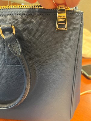 Lot 324 - A Prada royal blue Saffiano bag