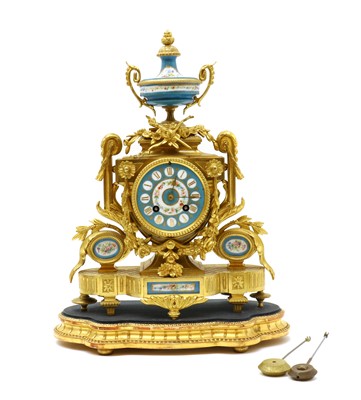 Lot 153 - A gilt bronze table clock