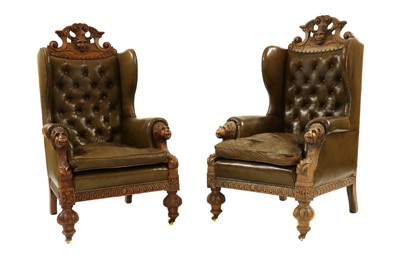 Lot 339 - A pair of late Victorian carved oak wing armchairs