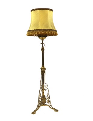 Lot 335 - A brass standard lamp