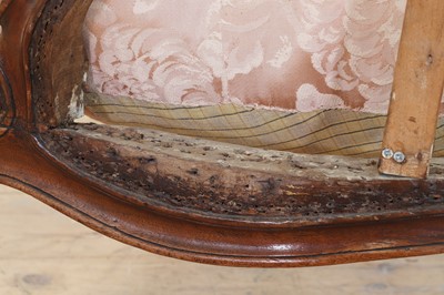 Lot 72 - A Louis XV carved walnut duchesse brisée