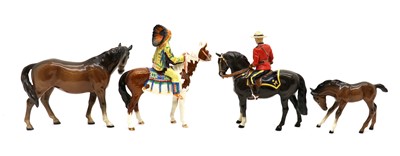 Lot 85 - A group of four Beswick pottery horses