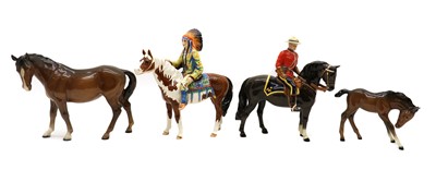 Lot 85 - A group of four Beswick pottery horses